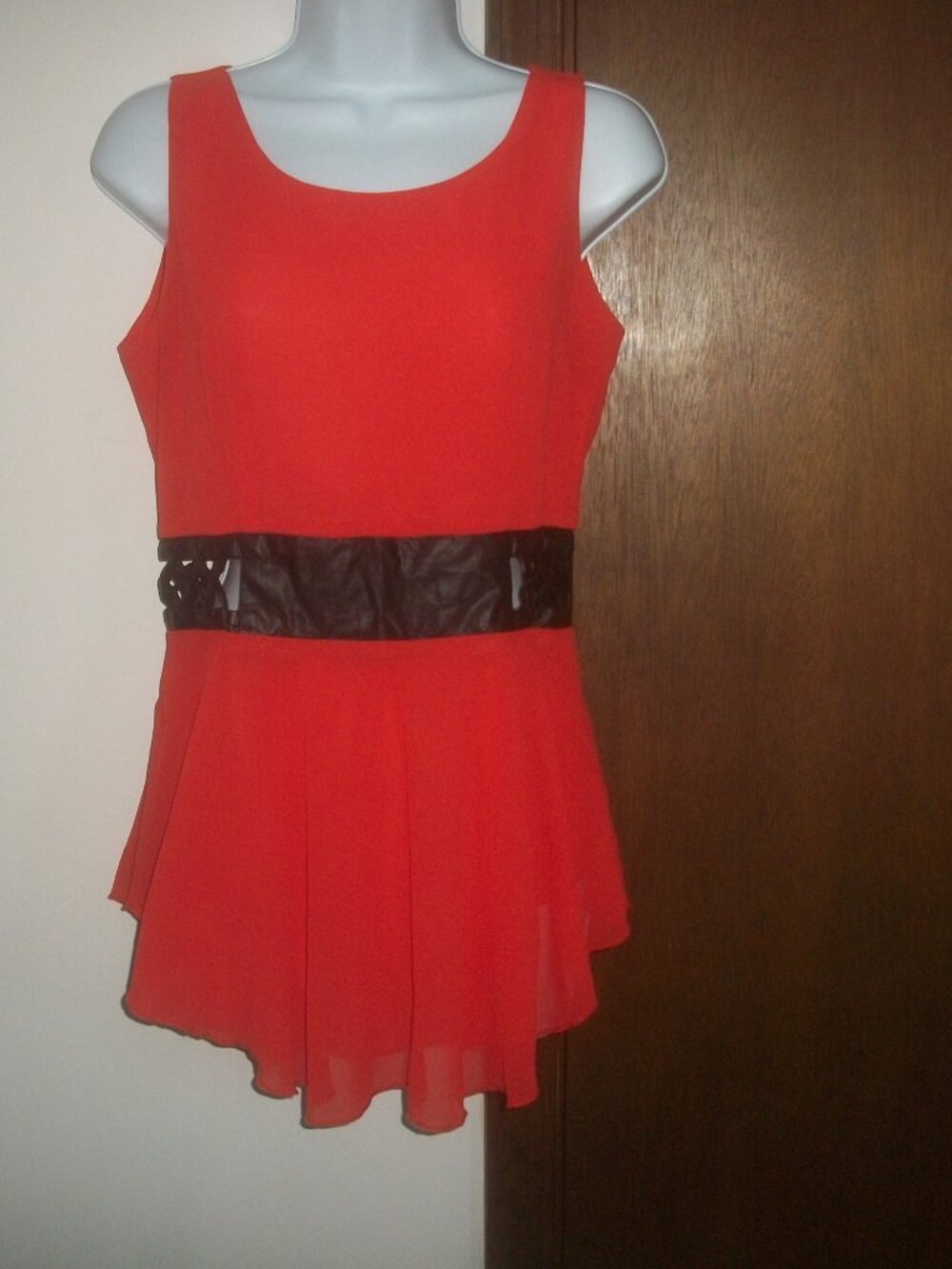 womens red peplum blouse. open weave waist.size medium